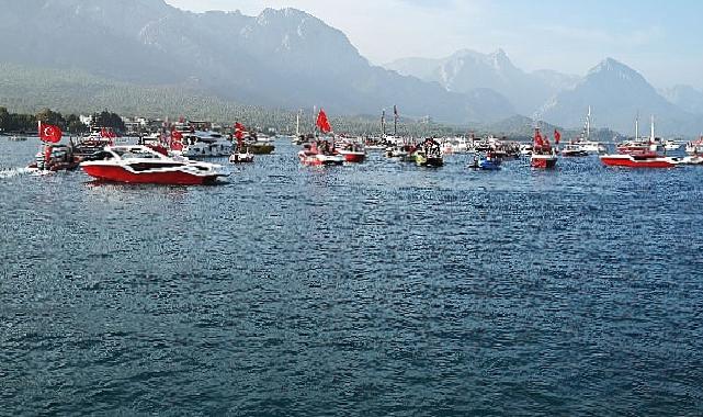 100 tekneden bayrak geçişi